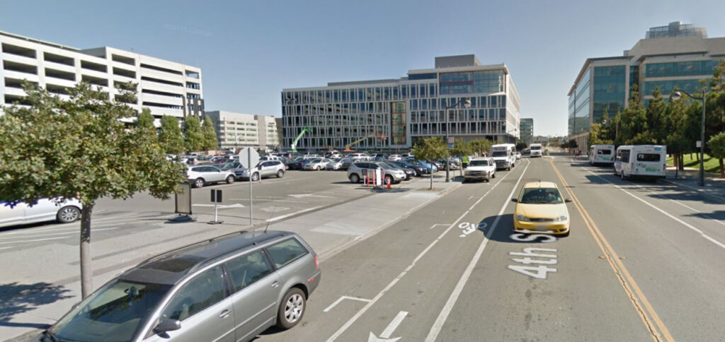 Big buildings with large parking structures and parking lots Mission Bay.